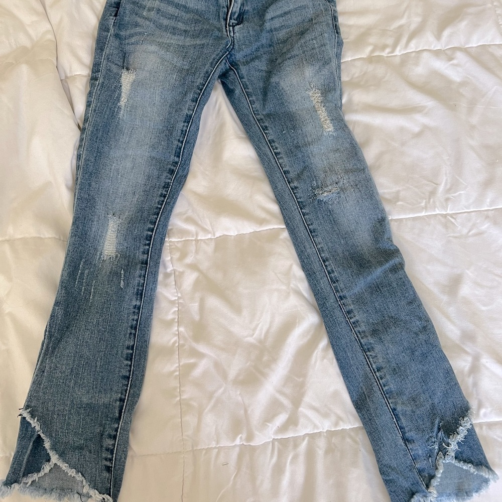 Slightly distressed light wash jeans